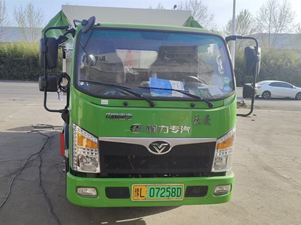 纯电重汽豪曼勾臂垃圾车